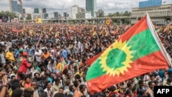 FILE - People gather to celebrate the return of the Oromo Liberation Front (OLF), a formerly banned opposition group, at Meskel Square in Addis Ababa, Ethiopia, Sept. 15, 2018.