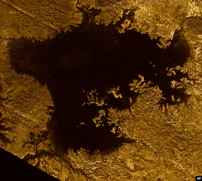 This 2007 image made available by NASA shows a hydrocarbon sea named Ligeia Mare on Saturn's moon Titan, as seen by the Cassini spacecraft.