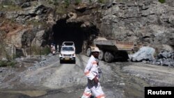 FILE - A worker is pictured at a mine in Bindura town, ZImbabwe, Feb. 7, 2015.