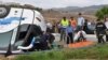 FILE: Rescue workers transport a victim after a tourist bus crashed in northern Morocco. Taken Sept. 8, 2010
