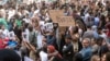 تظاهرات در لندن در اعتراض به نحوه واکنش دولت به حادثه آتش سوزی