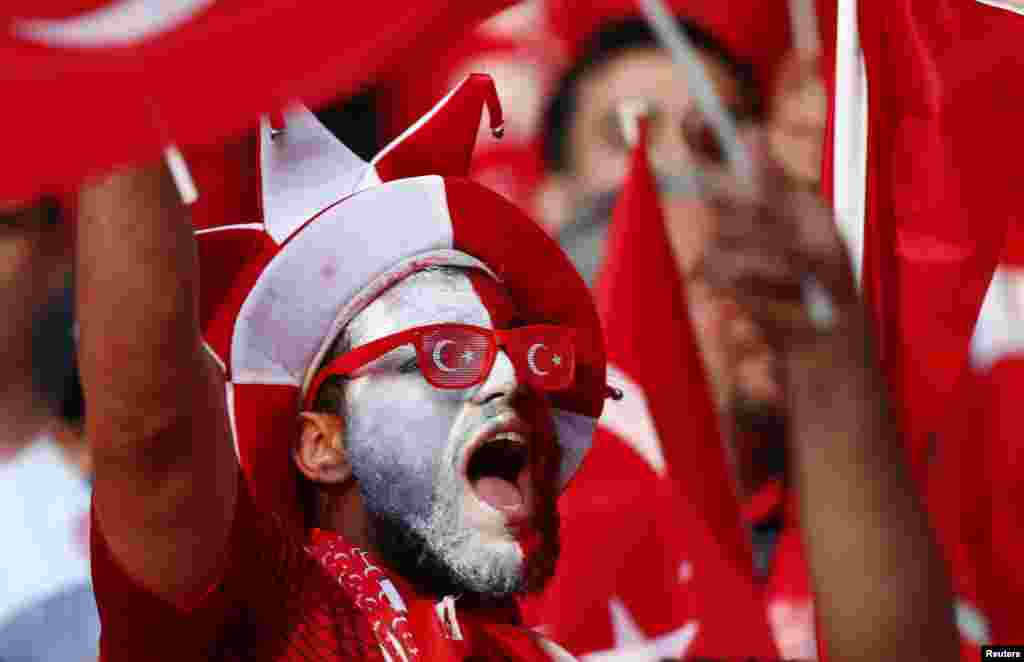 Turkish fans celebrate before the EURO 2016 Group D football match between Spain and Turkey in Nice, France.