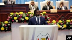 FILE - Congo's President Joseph Kabila speaks during the state of the nation address to the National Assembly in Kinshasa, Democratic Republic of Congo, July 19, 2018. 