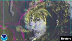 This NASA GOES satellite image shows Tropical Storm Ana as seen early in the day about 170 miles (275 kms) south-southeast of Myrtle Beach, South Carolina, May 8, 2015. 