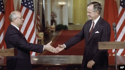 Image result for george h w bush gorbachev shake hands