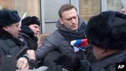 Алексей Навальный (в центре). Москва, Россия. 28 января 2018 г.