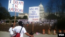 A father and daughter look out on the "All in for Citizenship" rally calling for an overhaul of U.S. immigration laws, Capitol HIll, Washington, DC, Wednesday, April 10, 2013. (Photo by Kate Woodsome)