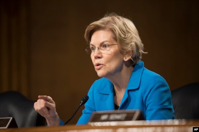 Sen. Elizabeth Warren, D-Mass., questions Federal Reserve Chairman Jerome Powell during hearing of the Senate Banking, Housing and Urban Affairs Committee, Feb. 26, 2019 in Washington.
