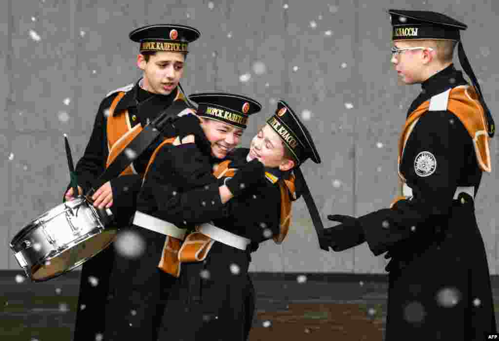 Russian cadets play during the annual cadet schools get-together in Moscow.