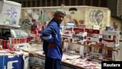 A vendor sells cigarettes on Cairo's Tahrir Square May 25, 2012.