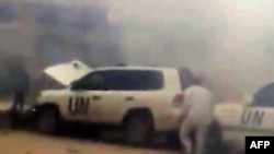 Video footage allegedly shows a UN observers' convoy seconds after a roadside bomb exploded in front of it in Syria