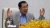 FILE - Cambodia's Prime Minister Hun Sen gestures during a speech on the current state of a new virus from China in Phnom Penh, Cambodia, Thursday, Jan. 30, 2020.
