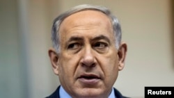 FILE - Israeli Prime Minister Benjamin Netanyahu calls for scrapping a U.N. inquiry into alleged war crimes by his country in Gaza last summer. 