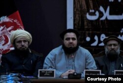 FILE - Afghan cleric Mawlavi Samiullah Rayhan, center, was killed in a mosque bombing in Kabul, May 24, 2019. (Undated photo courtesy of TOLO TV)
