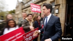 Britain's opposition Labour Party leader Ed Miliband leaves after a campaign event in Colne, northern England, May 6, 2015.