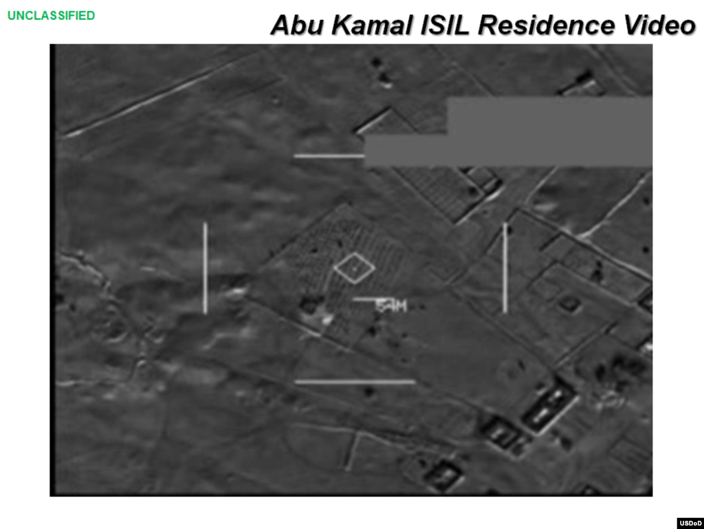 Press briefing slide - Frame from video of airstrike on Abu Kamal ISIL residence by coalition forces, Raqqah, Syria, Sept. 23, 2014, (U.S. Central Command Center) 
