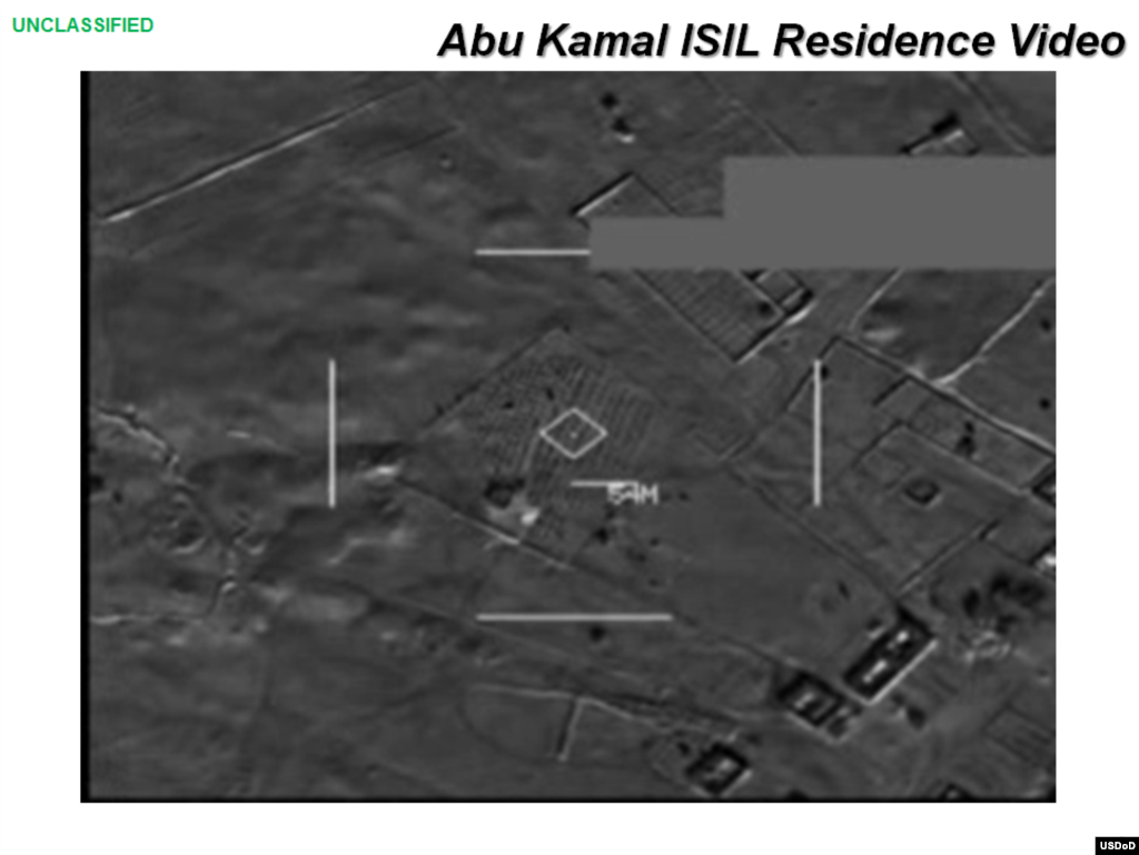 Press briefing slide - Frame from video of airstrike on Abu Kamal ISIL residence by coalition forces, Raqqah, Syria, Sept. 23, 2014, (U.S. Central Command Center)