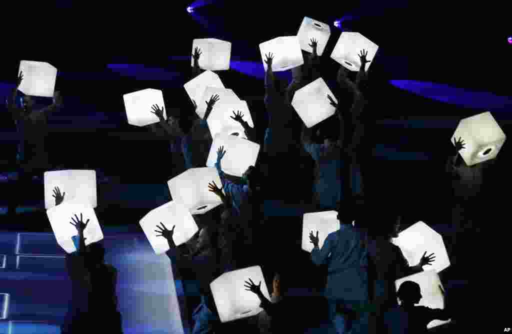 Dancers perform during a concert titled &quot;Mettle to the Top&quot; at the green hall theatee in Riyadh, Saudi Arabia, Sept. 21, 2019, marking Saudi 89th National Day celebrations.