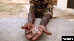 Rights group says nearly $2 billion worth of stolen diamonds has been going to cronies of President Robert Mugabe