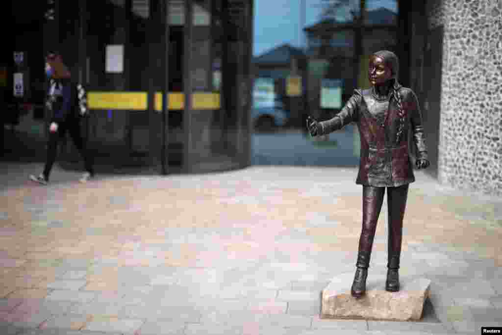 A statue of Swedish climate change activist Greta Thunberg is seen at Winchester University in Winchester, Britain.