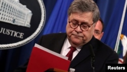 FILE - U.S. Attorney General William Barr leaves after speaking at a news conference to discuss Special Counsel Robert Mueller's report on Russian interference in the 2016 U.S. presidential race, in Washington, April 18, 2019.