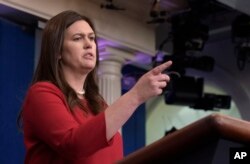 White House press secretary Sarah Huckabee Sanders speaks during the daily briefing at the White House in Washington, Aug. 2, 2017.