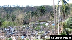 Scientists predict more extreme weather events like Typhoon Bopha which struck the Philippines in 2012, devastating homes. (OCHA)