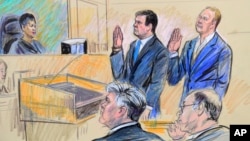 A court artist drawing shows President Donald Trump's former campaign chairman, Paul Manafort, center standing and Manafort's business associate, Rick Gates, in federal court in Washington, Oct. 30, 2017, before U.S. Magistrate Judge Deborah A. Robinson. 