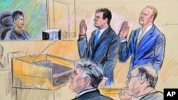 FILE - A court artist drawing shows President Donald Trump's former campaign chairman, Paul Manafort, center standing and Manafort's business associate, Rick Gates, in federal court in Washington, Oct. 30, 2017, before U.S. Magistrate Judge Deborah A. Robinson.