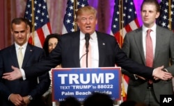 Republican presidential candidate Donald Trump speaks to supporters at his primary election night event at his Mar-a-Lago Club in Palm Beach, Fla., March 15, 2016.