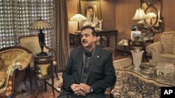 Pakistani Prime Minister Yousuf Raza Gilani during an interview with The Associated Press at his residence in Lahore, December 5, 2011.