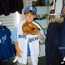 Nicholas Marcozzi, 10, got to throw out the first pitch at a recent game after his parents won the privilege at his school's fundraising auction.