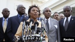 Rep. Barbara Lee, D-Calif., center, accompanied by fellow members of the Congressional Black Caucus, speaks to reporters outside the White House in Washington, following a meeting with President Barack Obama. (File Photo)