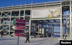 FILE - A facility is shown at the Russian Trebs and Titov oil fields near the Arctic village of Varandei, Russia, October 2013.