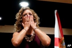 DNC Chairwoman, Debbie Wasserman Schultz, D-Fla., greeted the Florida delegation at a breakfast, July 25, 2016, in Philadelphia, during the first day of the Democratic National Convention.