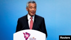新加坡总理李显龙在新加坡召开的第33届东盟年度峰会开幕式上讲话。（2018年11月13日）