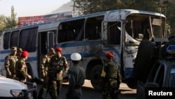 Afghan National Army soldiers (ANA) arrive at the site of a suicide attack in Kabul, October 1, 2014.