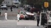 FILE - Investigators work around the wreckage of a Home Depot pickup truck that alleged terror suspect Sayfullo Saipov used to mow down people on a bike path in New York City, Nov. 1, 2017. (R. Taylor/VOA) 