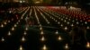 Georgians light candles for victims of the war with Russia as they mark the third anniversary of the conflict in Gori, Aug. 8, 2011. 