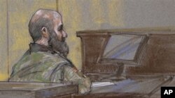 U.S. Army Maj. Nidal Malik Hasan shown as the guilty verdict is read at his court martial, Fort Hood, Texas, Aug. 27, 2013.