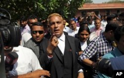 Defense attorney A. P. Singh, representing three of the four men convicted for the 2012 fatal gang rape on a moving bus, arrives to brief the media after the Supreme court verdict, in New Delhi, India, May 5, 2017.