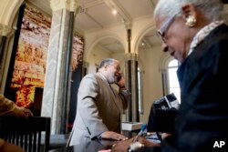 Lonnie Bunch, founding director of the Smithsonian's National Museum of African American History and Culture, speaks on the phone at the Smithsonian Castle in Washington, May 28, 2019.