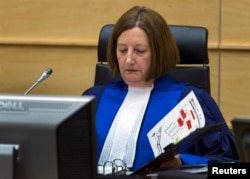 FILE - Judge Silvia Fernandez de Gurmendi sits in the courtroom of the International Criminal Court (ICC).