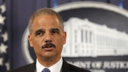 Attorney General Eric Holder speaks during a news conference at the Justice Department in Washington, Tuesday, Oct. 11, 2011