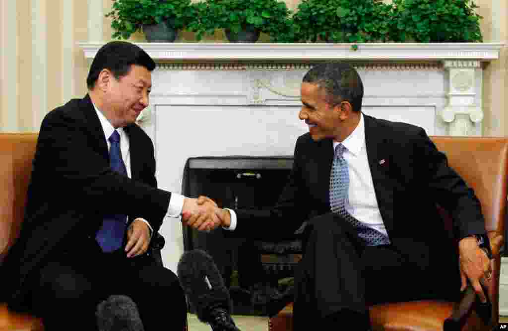 President Barack Obama shakes hands with Jinping in the Oval Office of the White House February 14, 2012. (Reuters)