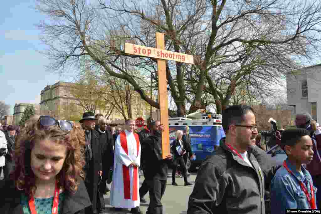 Cardinal Blase Cupich of the Roman Catholic Archdiocese of Chicago leads a prayer walk for peace through the Englewood neighborhood, which is regularly the scene of gun violence, Chicago's South Side, April 14, 2017. 