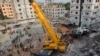Cranes Begin Clearing Bangladesh Building Collapse