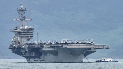 TƯ LIỆU: Hàng không mẫu hạm USS Theodore Roosevelt tiến vào cảng ở Đà Nẵng, Việt Nam, ngày 5 tháng 3, 2020.