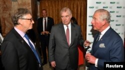 Bill Gates talks to Britain's Prince Andrew and Charles, Prince of Wales, during the Malaria Summit in London, Britain, April 18, 2018.