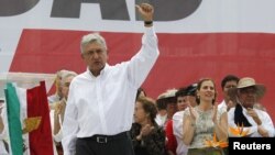 Election runner-up Andres Manuel Lopez Obrador waves to supporters